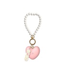 BULLET RECARREGÁVEL FORMATO DE CORAÇÃO COM ALÇA DE PEROLAS CONTROLE VIA APLICATIVO 10 MODOS DE VIBRAÇÃO - IMPORTAÇÃO BR041